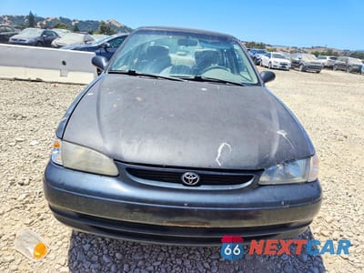 Piąte zdjęcie samochodu w środku: 2000 TOYOTA COROLLA VE VIN:1NXBR12E4YZ393319 - miniatura
