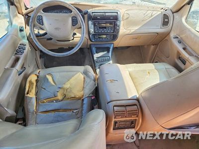 Zdjęcie 8 z 13 samochodu: 2000 FORD EXPLORER EDDIE BAUER VIN:1FMZU64P2YZC60618 - miniatura