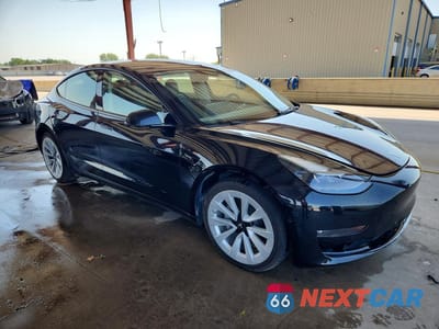 Czwarte zdjęcie samochodu z boku: 2022 TESLA MODEL 3 VIN:5YJ3E1EA4NF372049 - miniatura
