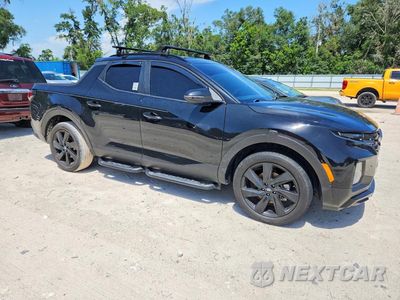 Czwarte zdjęcie samochodu z boku: 2024 HYUNDAI SANTA CRUZ NIGHT VIN:5NTJCDAFXRH097909 - miniatura