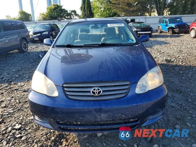 Piąte zdjęcie samochodu w środku: 2003 TOYOTA COROLLA LE VIN:JTDBR32EX30044861 - miniatura