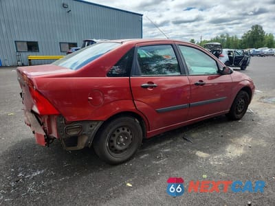 Trzecie zdjęcie samochodu z tyłu: 2003 FORD FOCUS LX VIN:1FAFP33Z83W302984 - miniatura