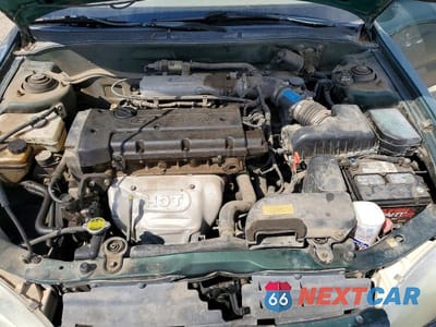 Zdjęcie 12 z 13 samochodu: 1997 HYUNDAI ELANTRA BASE VIN:KMHJF24M0VU594077 - miniatura