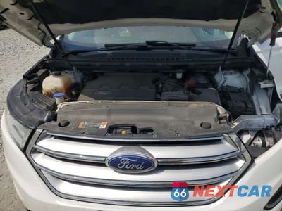 Zdjęcie 12 z 13 samochodu: 2015 FORD EDGE SEL VIN:2FMTK4J80FBB17065 - miniatura