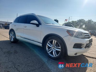 Czwarte zdjęcie samochodu z boku: 2011 VOLKSWAGEN TOUAREG V6 TDI VIN:WVGFK9BP6BD005908 - miniatura