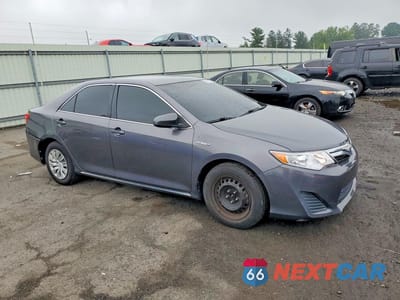 Czwarte zdjęcie samochodu z boku: 2014 TOYOTA CAMRY HYBRID LE VIN:4T1BD1FK7EU097706 - miniatura