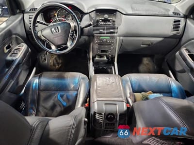Zdjęcie 8 z 14 samochodu: 2004 HONDA PILOT EXL VIN:2HKYF18624H567464 - miniatura