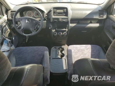 Zdjęcie 8 z 13 samochodu: 2003 HONDA CR-V LX VIN:JHLRD68413C000777 - miniatura