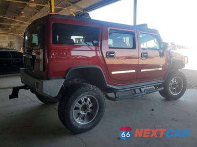 Trzecie zdjęcie samochodu z tyłu: 2003 HUMMER H2 VIN:5GRGN23U83H144409 - miniatura