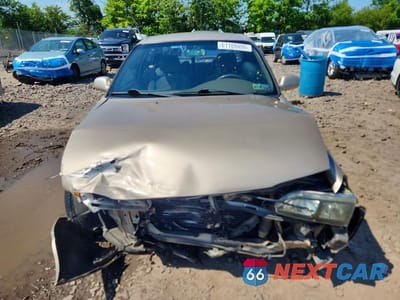 Piąte zdjęcie samochodu w środku: 1997 TOYOTA COROLLA DX VIN:2T1BB02E7VC193935 - miniatura