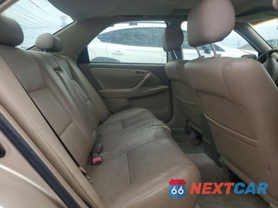 Zdjęcie 10 z 12 samochodu: 1999 TOYOTA CAMRY XLE VIN:JT2BG28K8X0284101 - miniatura