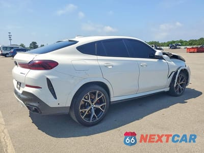 Trzecie zdjęcie samochodu z tyłu: 2021 BMW X6 XDRIVE40I VIN:5UXCY6C02M9G33929 - miniatura