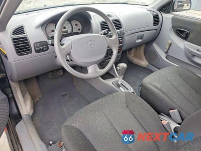 Zdjęcie 8 z 12 samochodu: 2004 HYUNDAI ACCENT GL VIN:KMHCG35C04U303951 - miniatura