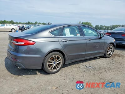 Trzecie zdjęcie samochodu z tyłu: 2020 FORD FUSION SEL VIN:3FA6P0CDXLR137171 - miniatura