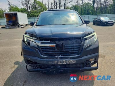 Piąte zdjęcie samochodu w środku: 2017 HONDA RIDGELINE BLACK EDITION VIN:5FPYK3F83HB038225 - miniatura