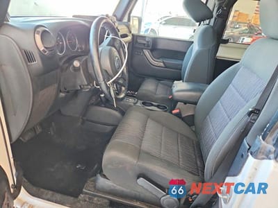 Zdjęcie 7 z 12 samochodu: 2012 JEEP WRANGLER SPORT VIN:1C4GJWAG3CL259210 - miniatura