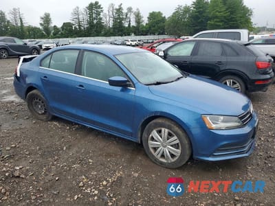 Czwarte zdjęcie samochodu z boku: 2017 VOLKSWAGEN JETTA S VIN:3VW2B7AJ8HM331403 - miniatura