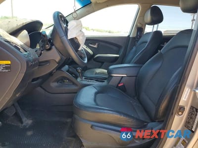 Zdjęcie 7 z 12 samochodu: 2010 HYUNDAI TUCSON GLS VIN:KM8JUCAC1AU052763 - miniatura