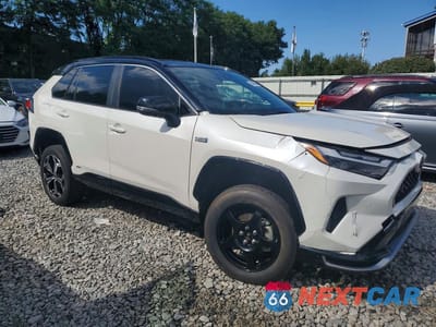 Czwarte zdjęcie samochodu z boku: 2021 TOYOTA RAV4 PRIME XSE VIN:JTMFB3FV5MD012071 - miniatura