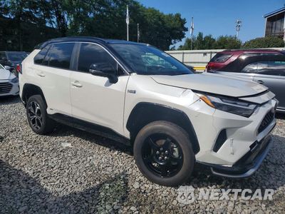 Czwarte zdjęcie samochodu z boku: 2021 TOYOTA RAV4 PRIME XSE VIN:JTMFB3FV5MD012071 - miniatura