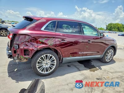 Trzecie zdjęcie samochodu z tyłu: 2017 LINCOLN MKX RESERVE VIN:2LMPJ6LR1HBL44312 - miniatura