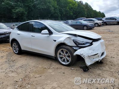 Czwarte zdjęcie samochodu z boku: 2021 TESLA MODEL Y VIN:5YJYGDEE5MF228903 - miniatura