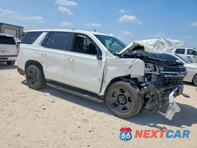 Czwarte zdjęcie samochodu z boku: 2021 CHEVROLET TAHOE C1500 VIN:1GBSCLED4MR297423 - miniatura