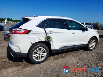 Trzecie zdjęcie samochodu z tyłu: 2020 FORD EDGE SEL VIN:2FMPK4J98LBB14212 - miniatura
