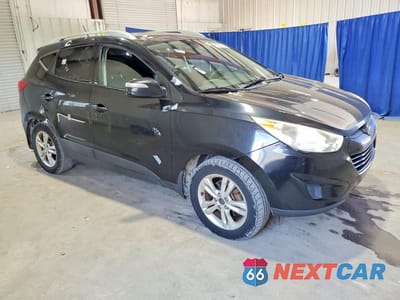 Czwarte zdjęcie samochodu z boku: 2012 HYUNDAI TUCSON GLS VIN:KM8JU3AC3CU435834 - miniatura