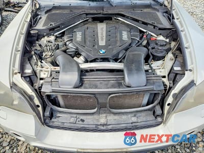 Zdjęcie 12 z 13 samochodu: 2012 BMW X5 XDRIVE50I VIN:5UXZV8C5XCL422566 - miniatura