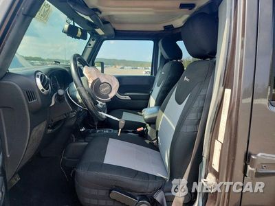 Zdjęcie 7 z 13 samochodu: 2014 JEEP WRANGLER UNLIMITED SAHARA VIN:1C4HJWEG9EL203631 - miniatura
