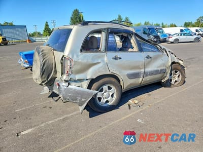 Trzecie zdjęcie samochodu z tyłu: 2003 TOYOTA RAV4 BASE VIN:JTEHH20V936084156 - miniatura