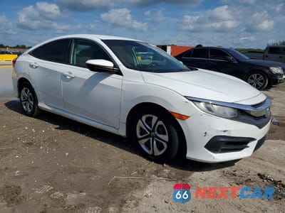 Czwarte zdjęcie samochodu z boku: 2018 HONDA CIVIC LX VIN:2HGFC2F59JH575518 - miniatura