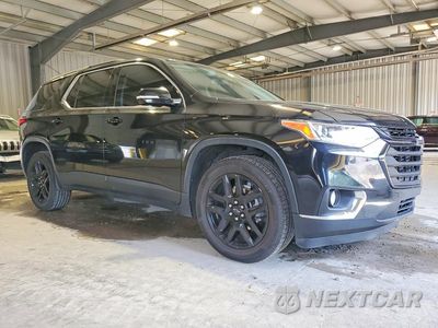 Czwarte zdjęcie samochodu z boku: 2019 CHEVROLET TRAVERSE LT VIN:1GNEVGKW6KJ188304 - miniatura
