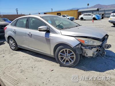 Czwarte zdjęcie samochodu z boku: 2016 FORD FOCUS SE VIN:1FADP3F27GL286497 - miniatura