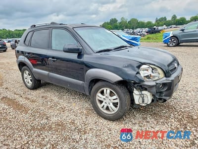 Czwarte zdjęcie samochodu z boku: 2007 HYUNDAI TUCSON SE VIN:KM8JN12D77U636893 - miniatura