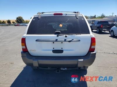 Zdjęcie 6 z 13 samochodu: 2000 JEEP GRAND CHEROKEE LAREDO VIN:1J4GW48S6YC114132 - miniatura