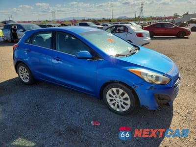 Czwarte zdjęcie samochodu z boku: 2017 HYUNDAI ELANTRA GT BASE VIN:KMHD35LH4HU350013 - miniatura