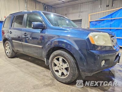 Czwarte zdjęcie samochodu z boku: 2009 HONDA PILOT TOURING VIN:5FNYF48869B037264 - miniatura