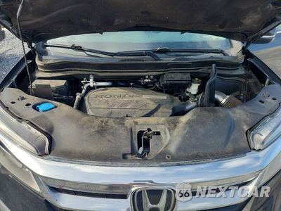 Zdjęcie 11 z 12 samochodu: 2020 HONDA PILOT TOURING VIN:5FNYF6H60LB038380 - miniatura