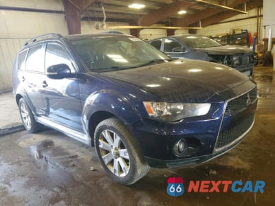 Czwarte zdjęcie samochodu z boku: 2010 MITSUBISHI OUTLANDER SE VIN:JA4JT3AW7AZ015196 - miniatura