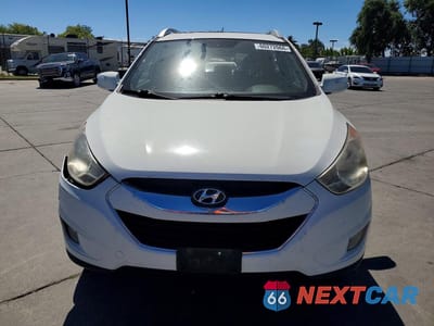 Piąte zdjęcie samochodu w środku: 2010 HYUNDAI TUCSON LIMITED VIN:KM8JU3AC5AU085796 - miniatura