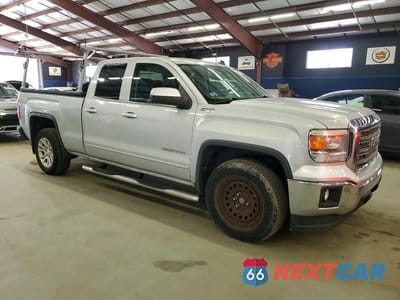 Czwarte zdjęcie samochodu z boku: 2014 GMC SIERRA K1500 SLE VIN:1GTV2UEC4EZ223381 - miniatura