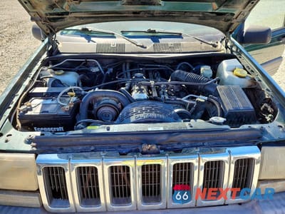 Zdjęcie 12 z 13 samochodu: 1997 JEEP GRAND CHEROKEE LAREDO VIN:1J4GZ58S6VC727280 - miniatura