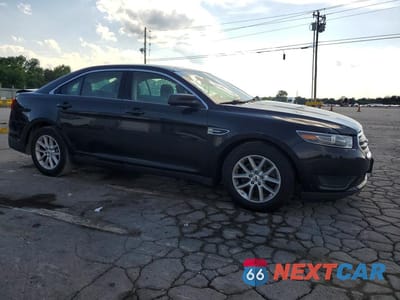 Czwarte zdjęcie samochodu z boku: 2014 FORD TAURUS SE VIN:1FAHP2D99EG165035 - miniatura