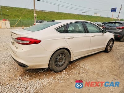 Trzecie zdjęcie samochodu z tyłu: 2017 FORD FUSION TITANIUM VIN:3FA6P0K92HR136830 - miniatura