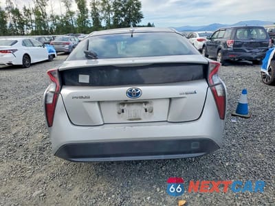 Zdjęcie 6 z 13 samochodu: 2016 TOYOTA PRIUS TWO VIN:JTDKBRFUXG3516375 - miniatura