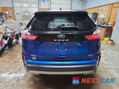 Zdjęcie 6 z 14 samochodu: 2021 FORD EDGE SEL VIN:2FMPK4J95MBA65200 - miniatura
