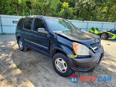 Czwarte zdjęcie samochodu z boku: 2002 HONDA CR-V LX VIN:JHLRD68432C009964 - miniatura