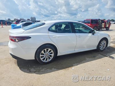 Trzecie zdjęcie samochodu z tyłu: 2024 TOYOTA CAMRY LE VIN:4T1R11AK8RU210261 - miniatura